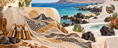 Encaje contemporáneo inspirado en un paisaje volcánico de Lanzarote junto a bolillos